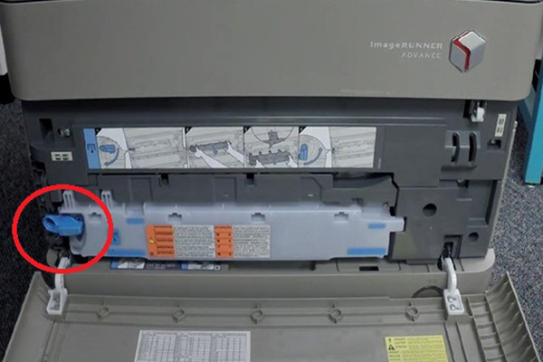 STEP TWO: REMOVE THE WASTE TONER CARTRIDGE