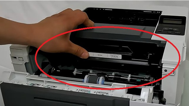 Reinserting the toner cartridge and reconnecting the power cord