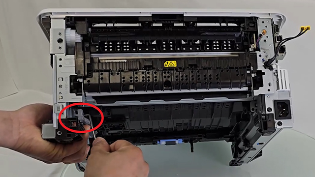 Pulling down the pressure release link arm