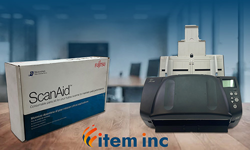 Fujitsu ScanAid kit and Fujitsu scanner displayed on a table with Item, Inc. logo at the bottom.