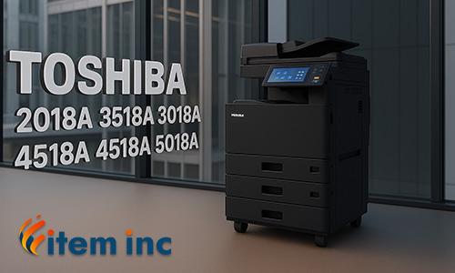 Toshiba multifunction printer in a modern office with neumorphic text and model numbers on the glass wall.