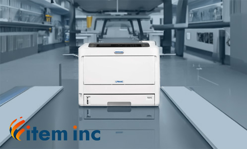 Printronix LP844C color label printer powering bold, high-impact labeling in a modern workspace with the Item, Inc. logo